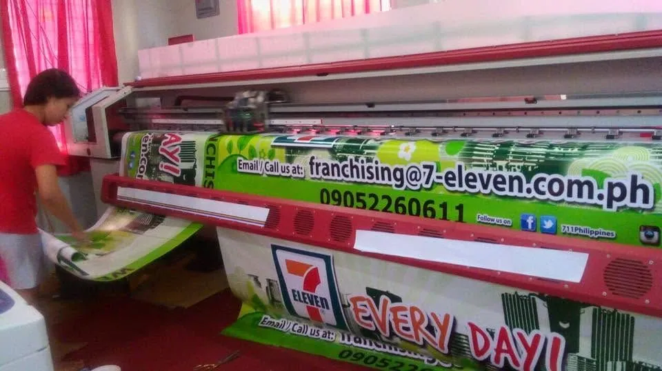 7-Eleven tarpaulin, fresh off MCAV's printer