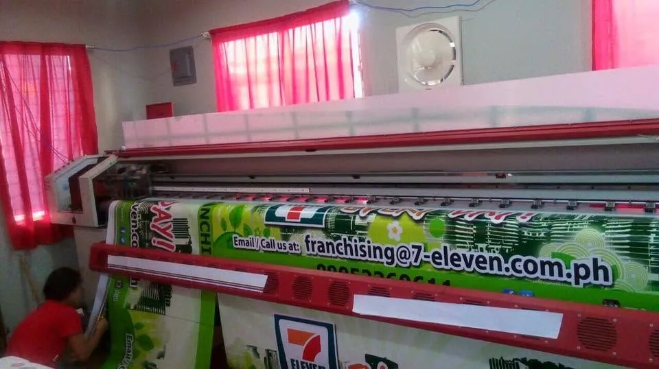 7-Eleven tarpaulin, fresh off MCAV's printer