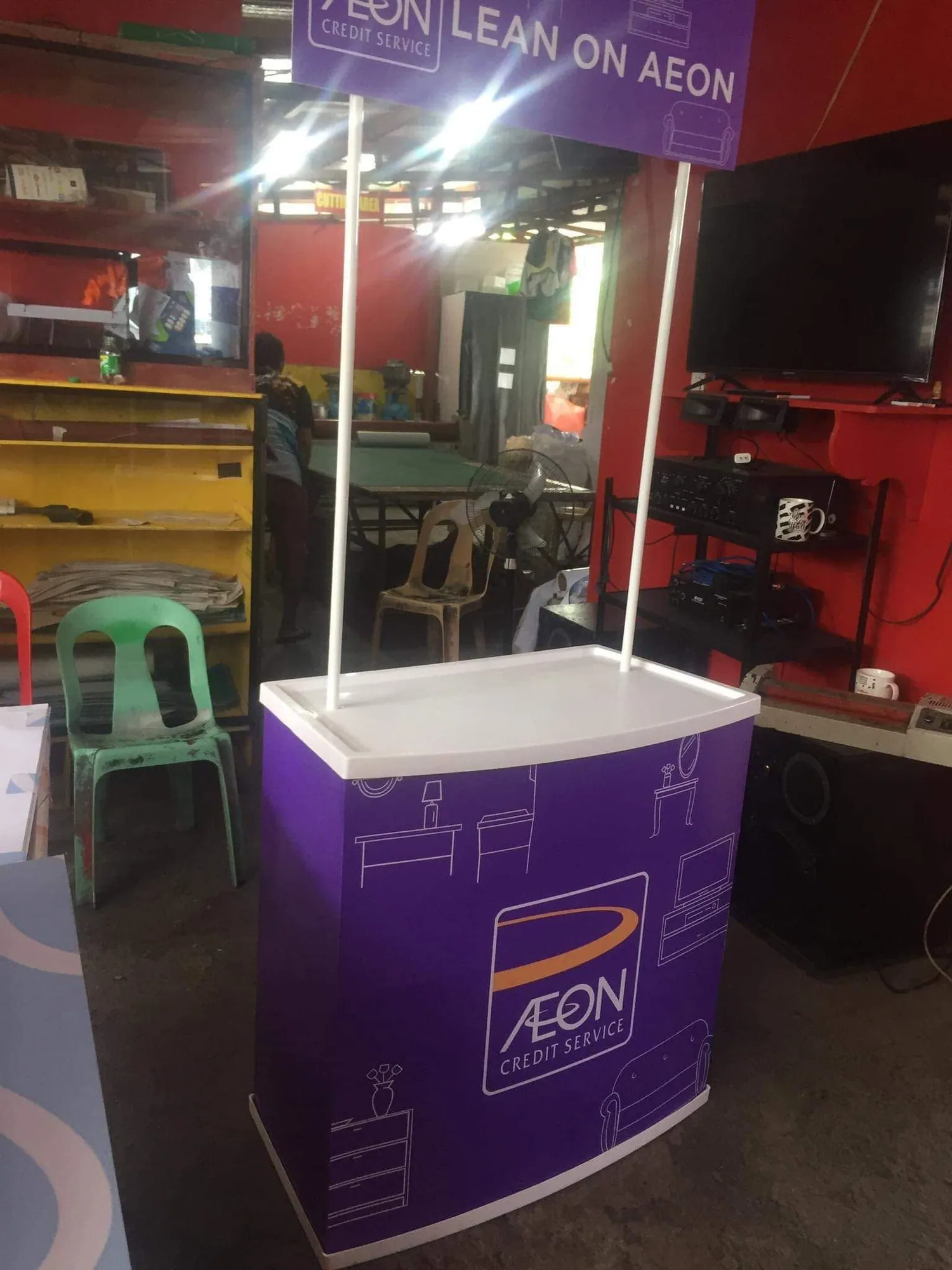 AEON Credit Service display banner, fresh off MCAV's printer