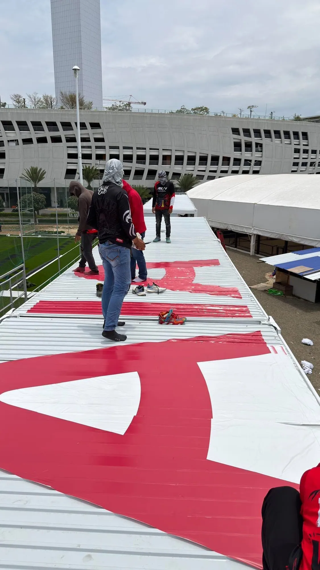 MCAV crew installing an AIA vinyl graphics