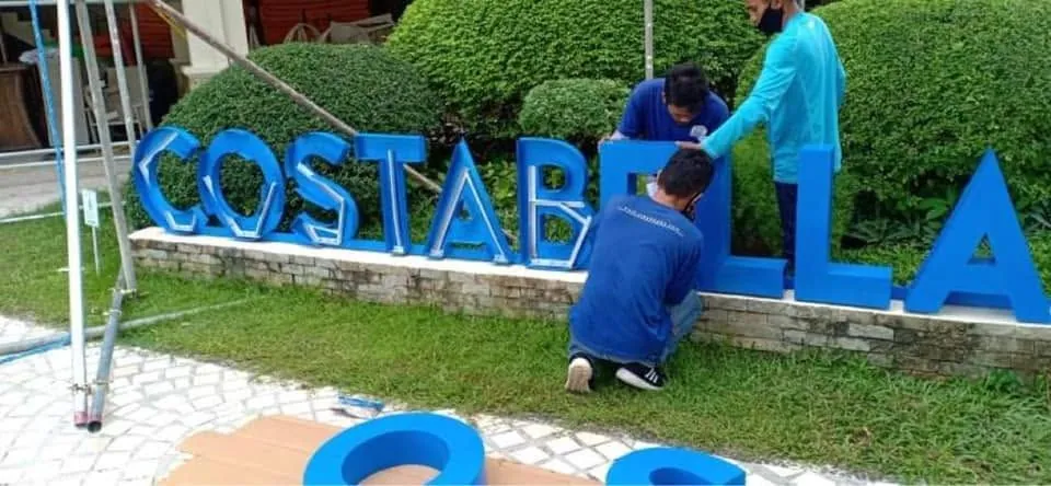 MCAV crew installing a Costabella aluminum built-up letters