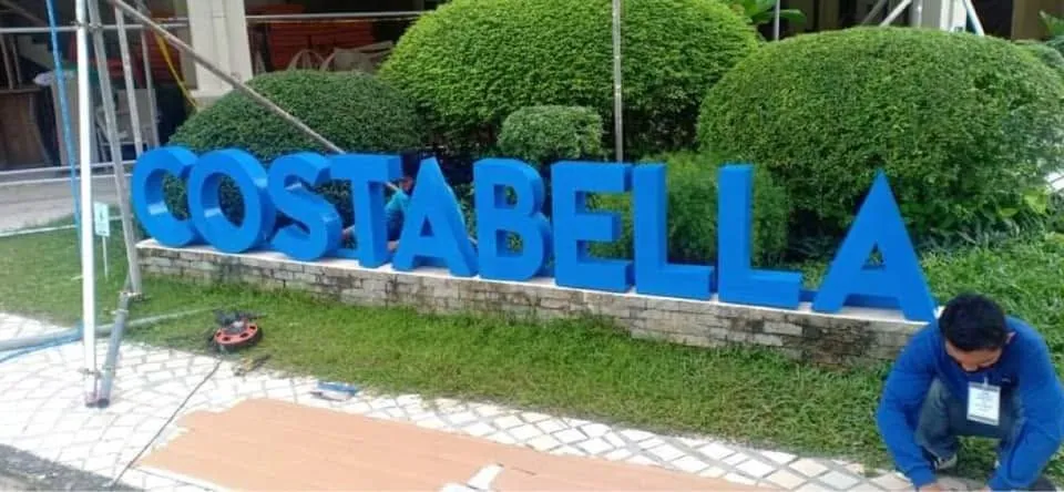 MCAV crew installing a Costabella aluminum built-up letters
