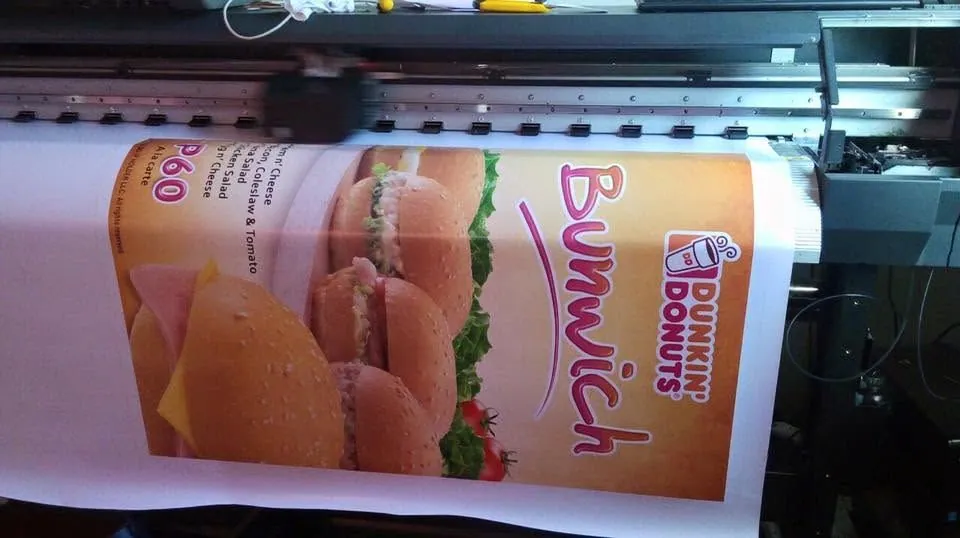 Dunkin' tarpaulin, fresh off MCAV's printer