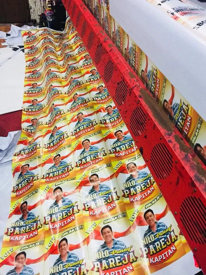 MCAV crew installing an Election campaign tarpaulin