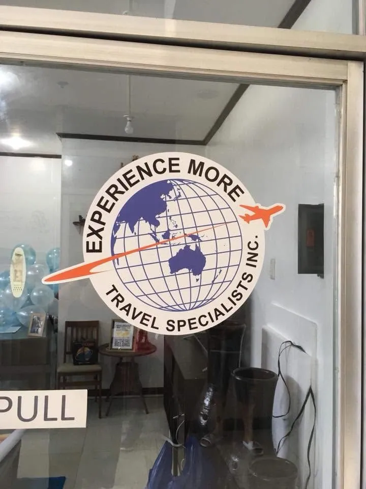 Experience More Travel Specialists Inc. die-cut stickers, printed and installed by MCAV