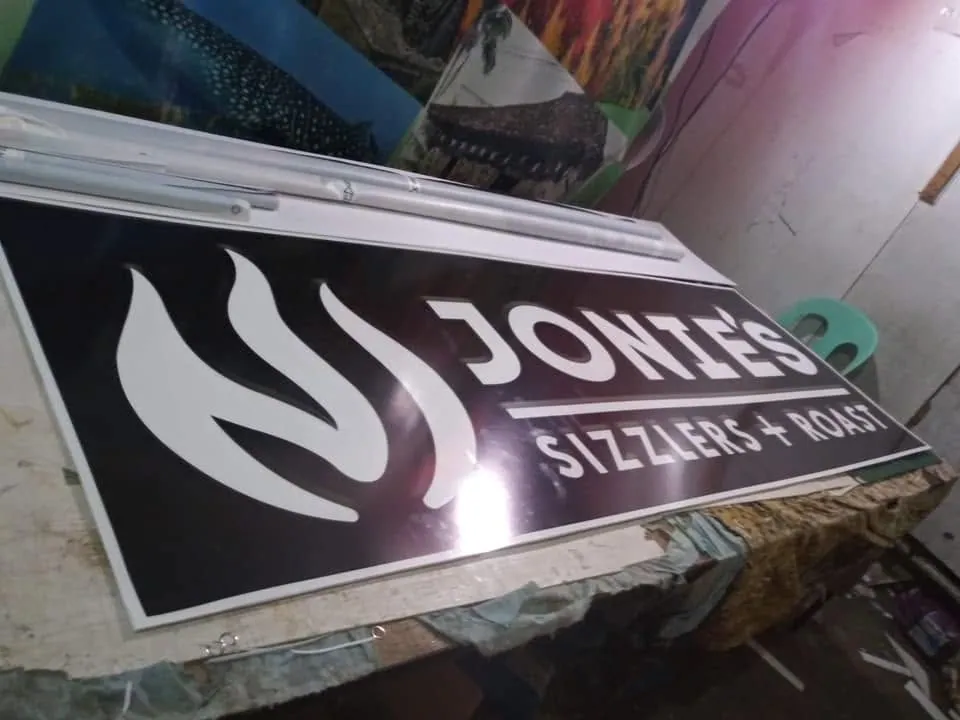 Jonie's Sizzlers + Roast sintra board display, fresh off MCAV's printer