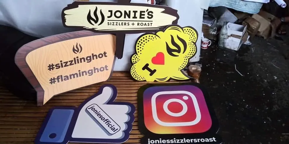 Jonie's Sizzlers + Roast sintra board display, fresh off MCAV's printer
