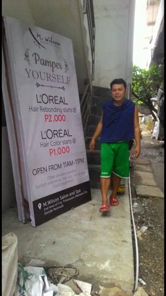 M. Wilson Salon and Spa framed tarpaulin, fresh off MCAV's printer