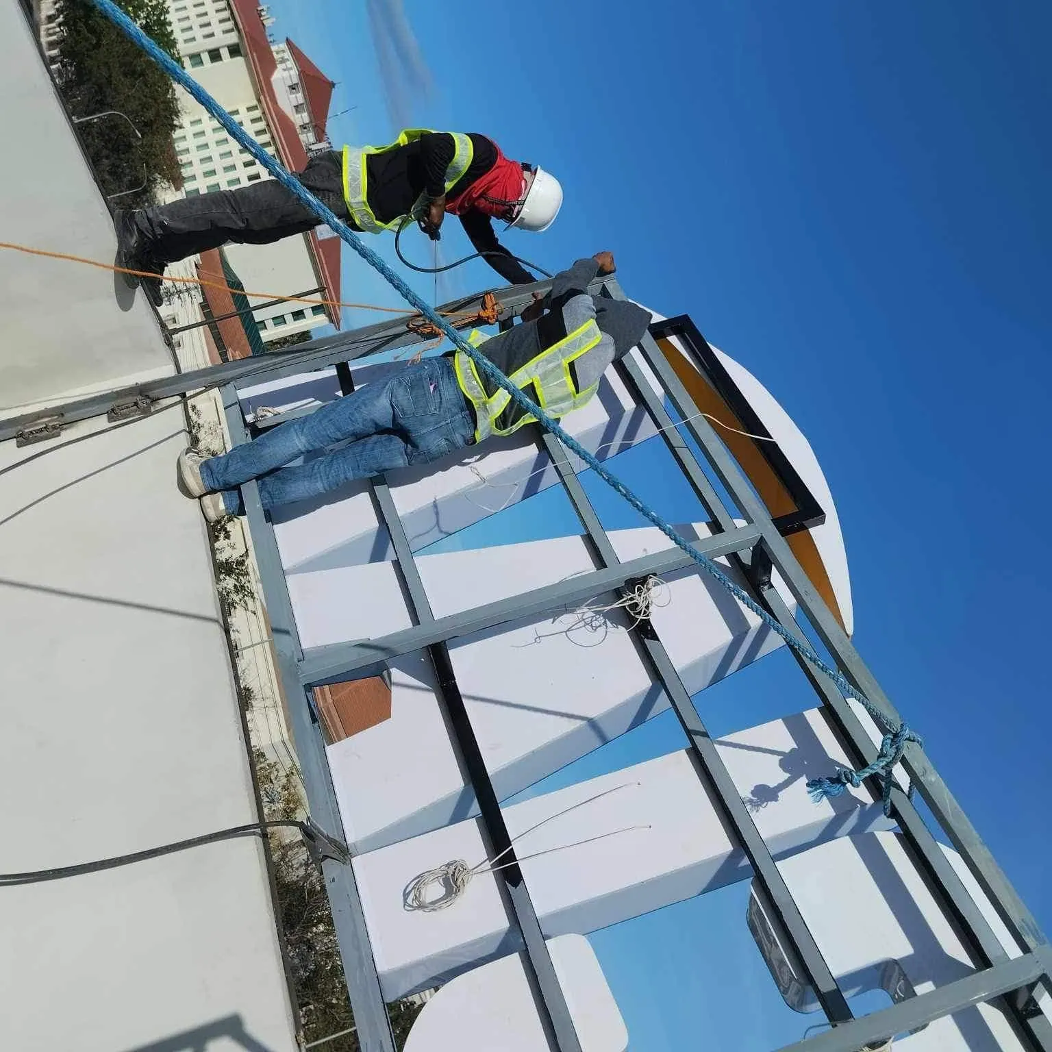 MCAV crew installing a MCIAA acrylic built-up letters
