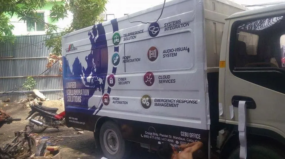 Microdata Systems and Management, Inc. vehicle wrap at Mandaue City, printed and installed by MCAV