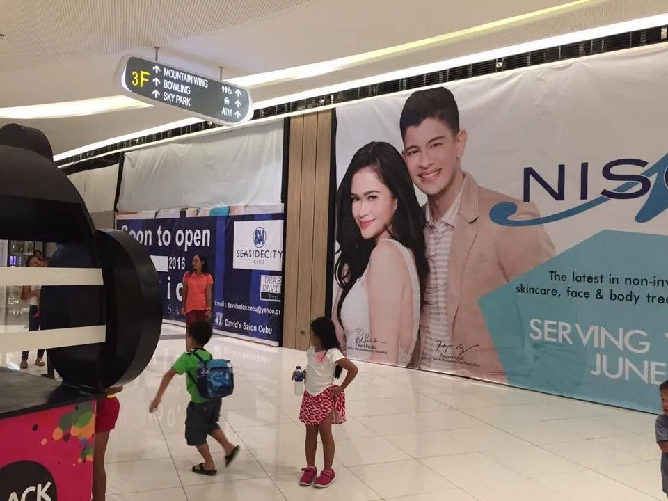 Nisce Skin 'N Face tarpaulin at SM Seaside City Cebu, printed and installed by MCAV