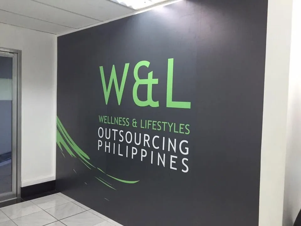 W&L Wellness & Lifestyles Outsourcing Philippines vinyl graphics, printed and installed by MCAV