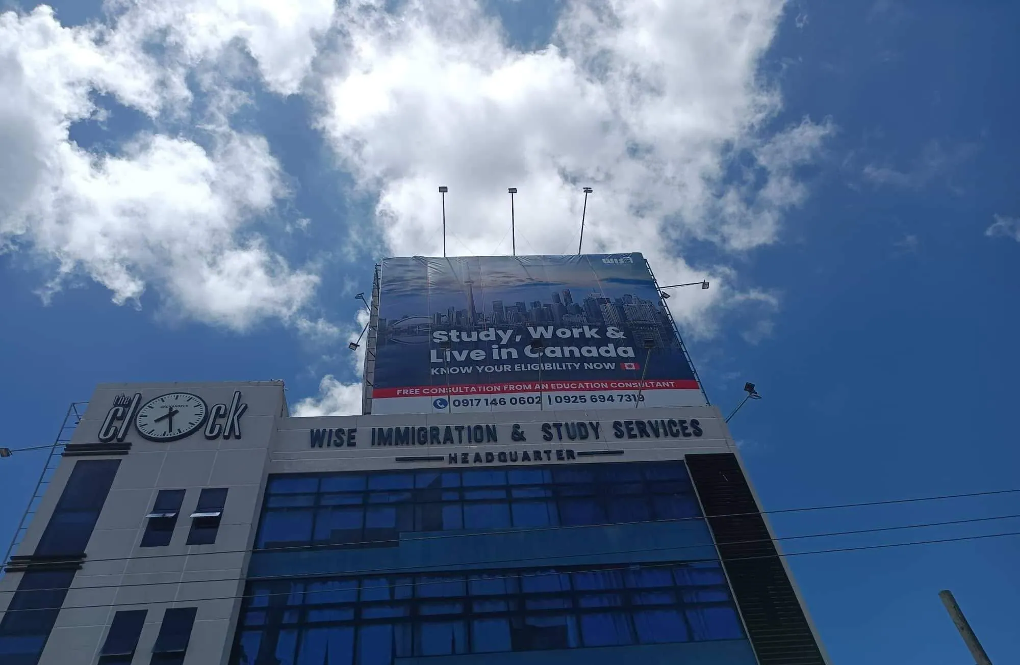 Wise Immigration & Study Services billboard, printed and installed by MCAV