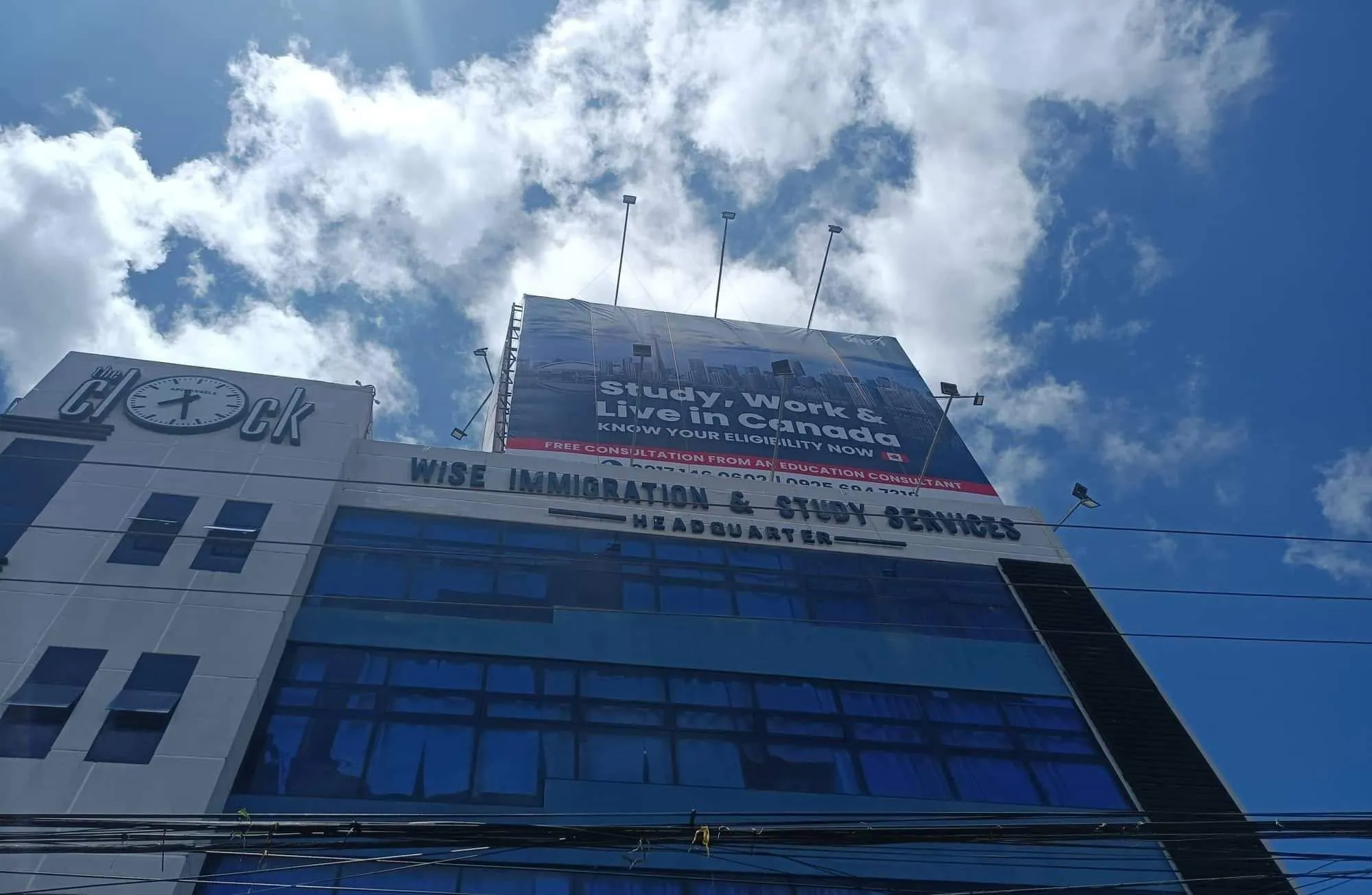 Wise Immigration & Study Services billboard, printed and installed by MCAV