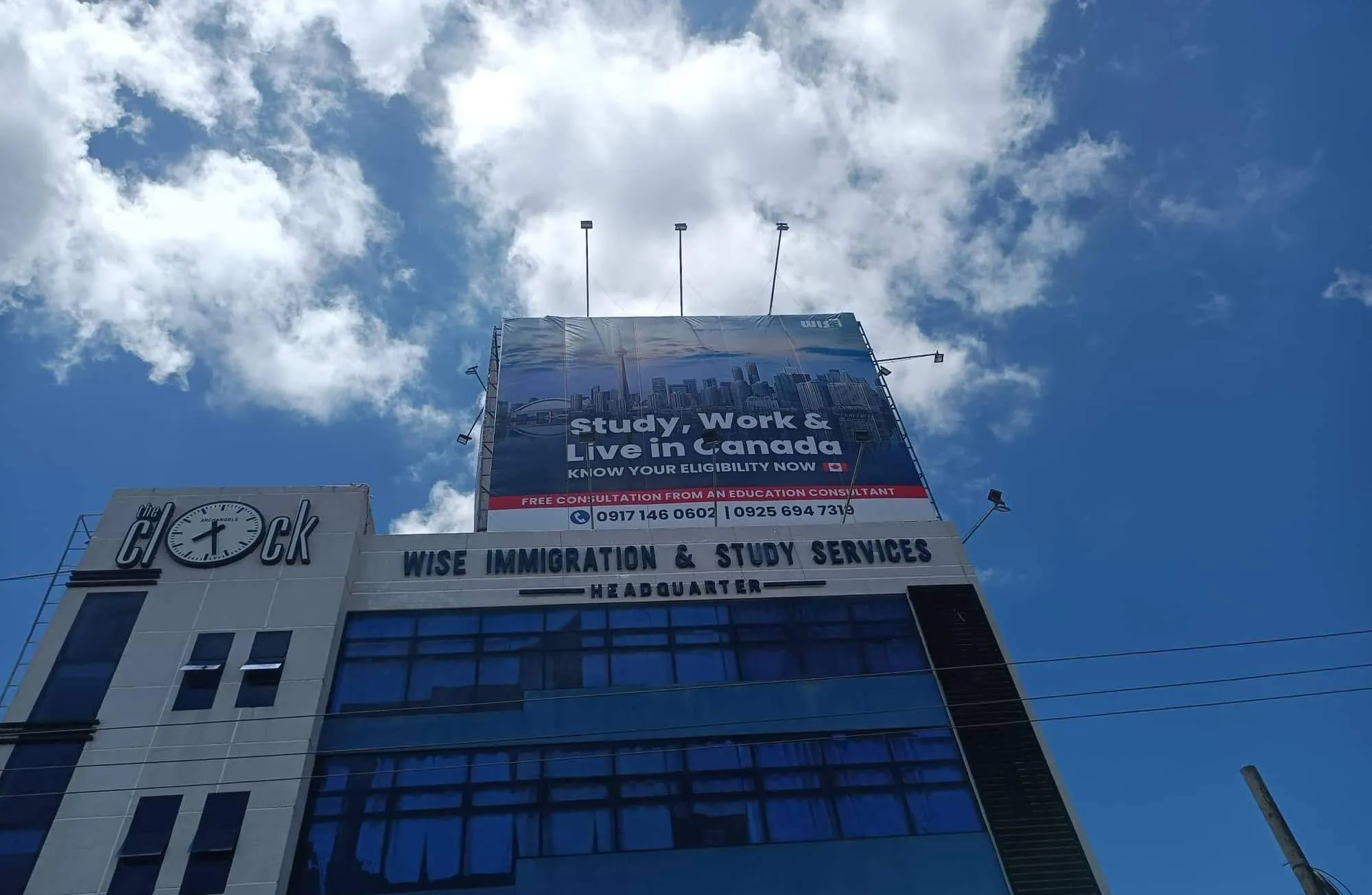Wise Immigration & Study Services billboard, printed and installed by MCAV